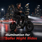 Person riding a motorcycle with illuminated features against a city night background - windhorse d1